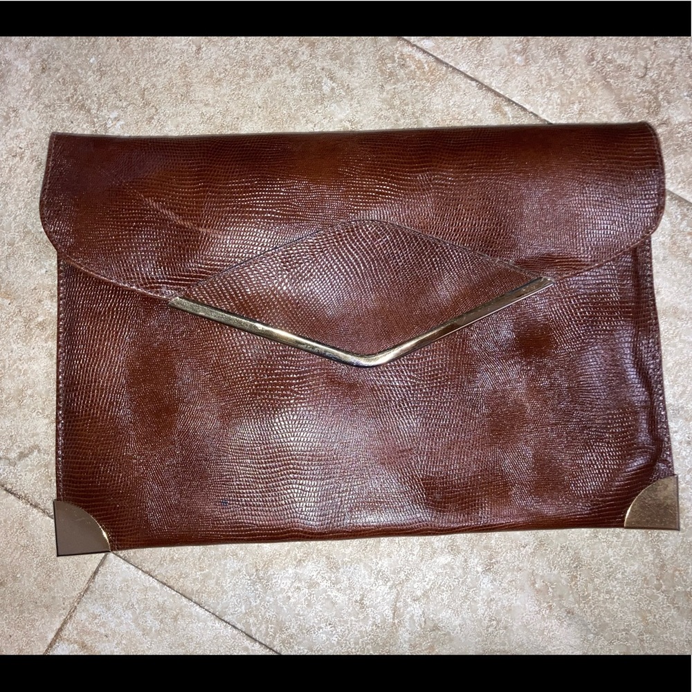 Vintage brown envelope Phillippe clutch.